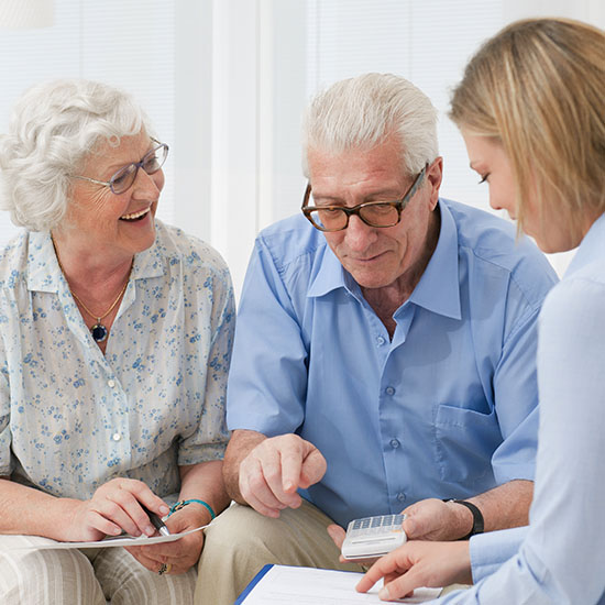 Old couple consulting about selling